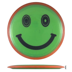 Green disc with smiley face.