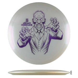 Discraft Undertaker disc golf disc with zombie graphic.